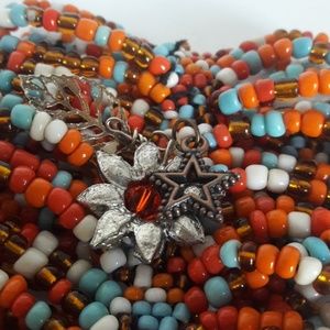 Handmade bead bracelet with charms